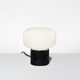 The Arca Petite Opalia Table Lamp Featuring a Black Marble Base