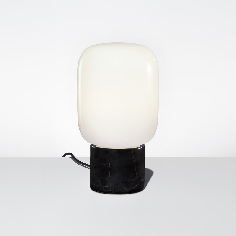 The Arca Tall Table Lamp Featuring a Black Marble Base and Opalia Glass Shade