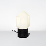 The Facet Petite Opalia Table Lamp Featuring a Black Marble Base