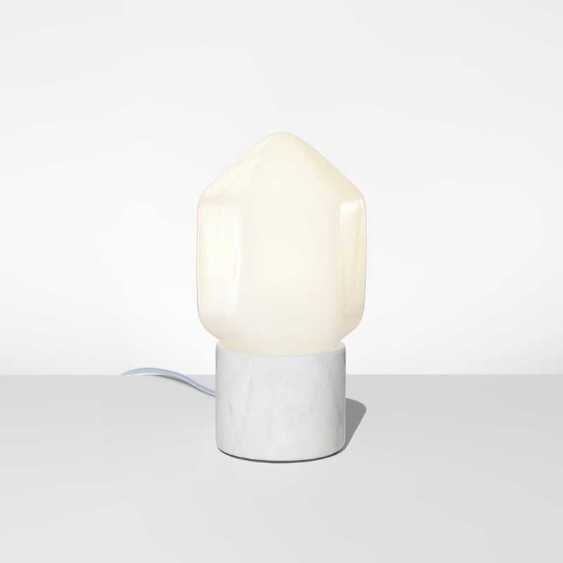 The Facet Petite Opalia Table Lamp Featuring a White Marble Base